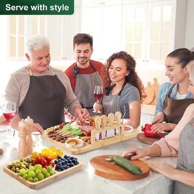 Πίνακα τυριού από μπαμπού και μαχαίρι για κοπή κουζίνας