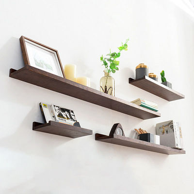 Στον τοίχο τοποθετημένο στερεό ξύλο πλωτό ράφι